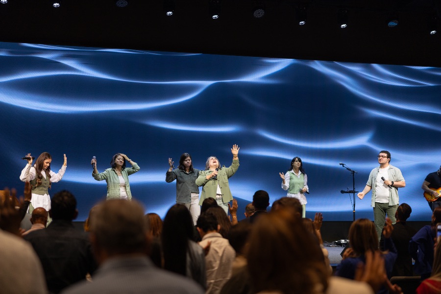 Two large LED video walls installed by AES Integration at Reach Church in Hyannis, MA, behind the worship team