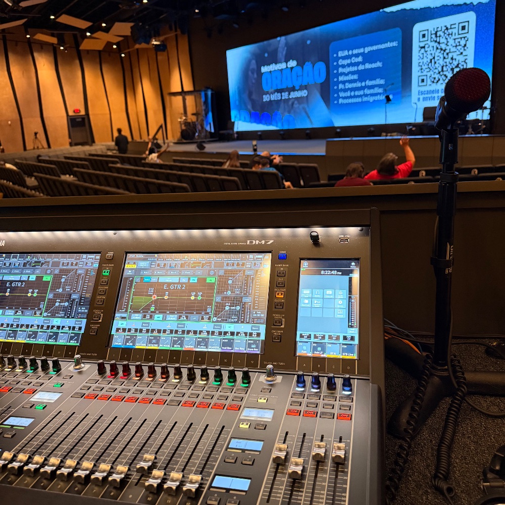 Overview of the Reach Church sanctuary in Hyannis with the AES-installed Yamaha DM7 console at front-of-house and the congregation beyond